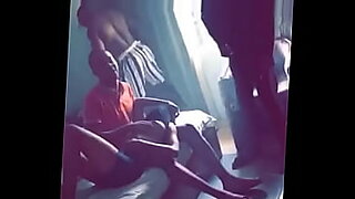 guy tied by girl on bed